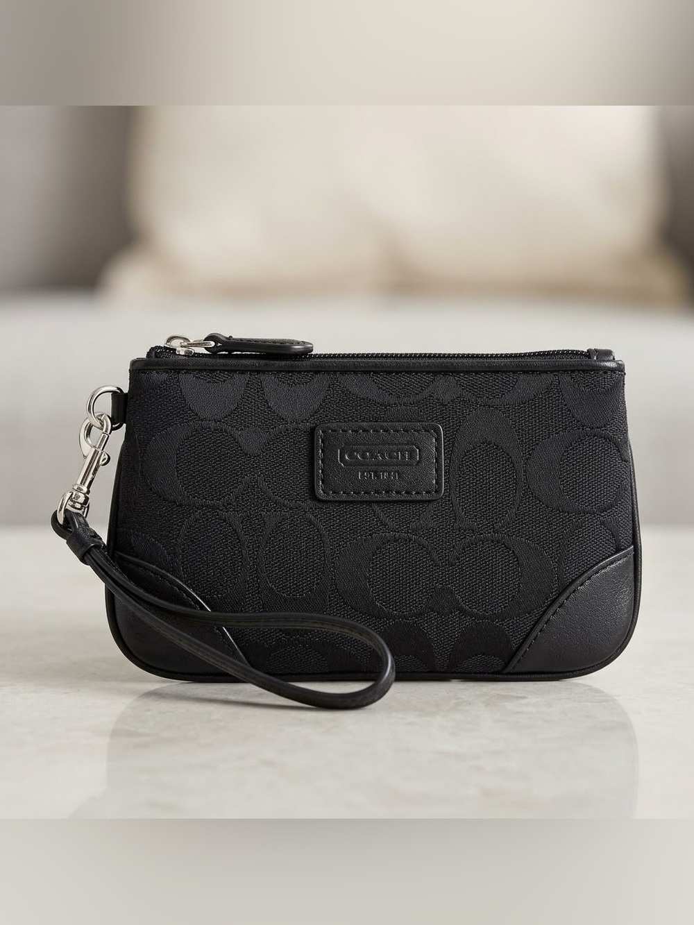 Authentic Coach black wristlet, excellent condition, zipper, logo, 4x6 in